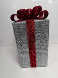 Silver Holiday Gift Box with Red Glitter Bow and Bell