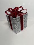 Silver Holiday Gift Box with Red Glitter Bow and Bell