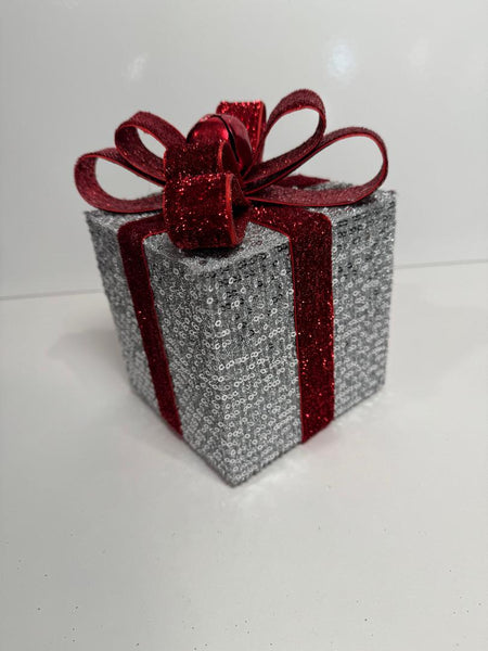 Silver Holiday Gift Box with Red Glitter Bow and Bell
