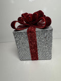Silver Holiday Gift Box with Red Glitter Bow and Bell